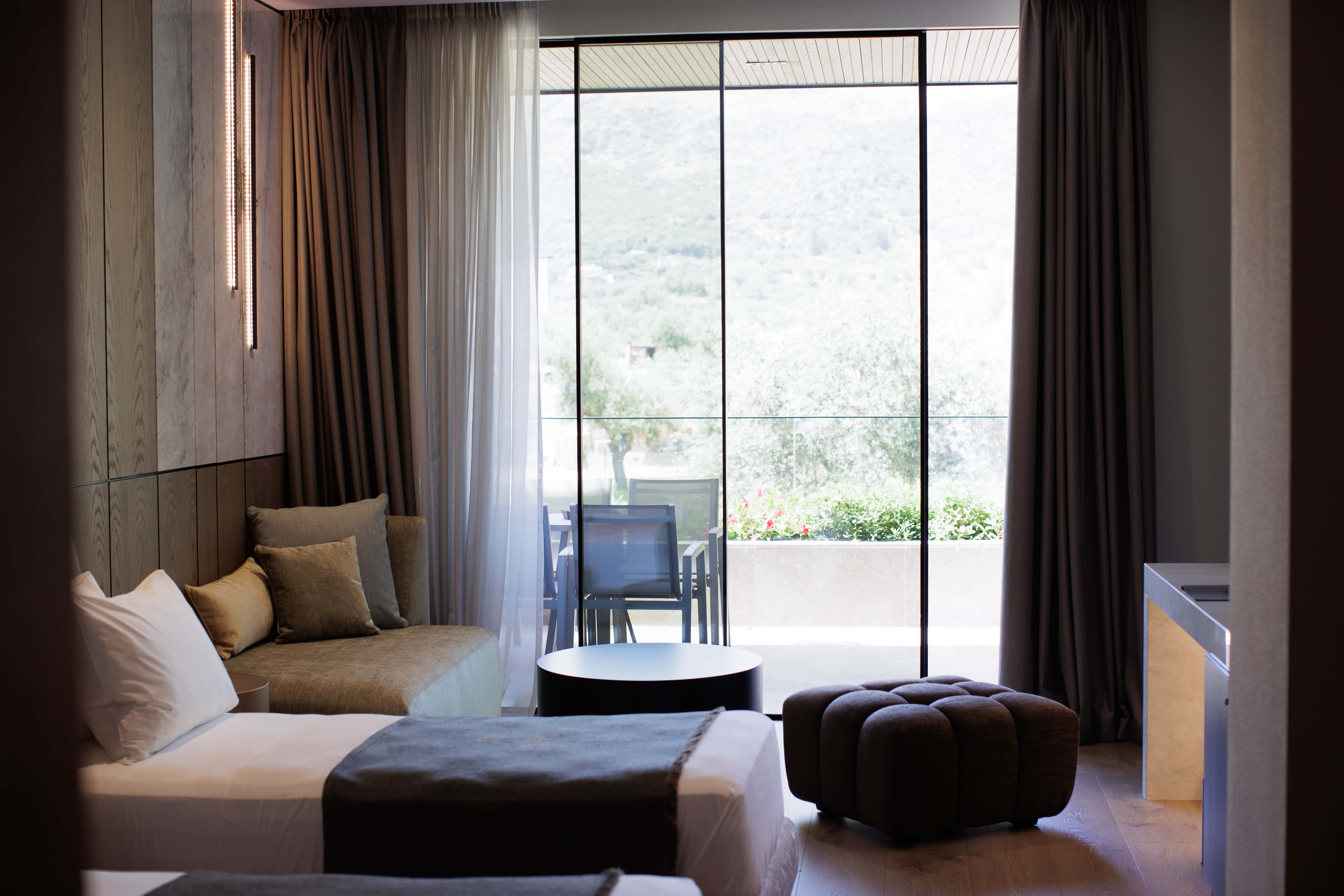 prado_luxury_hotel_room_standard_family_living_area_balcony