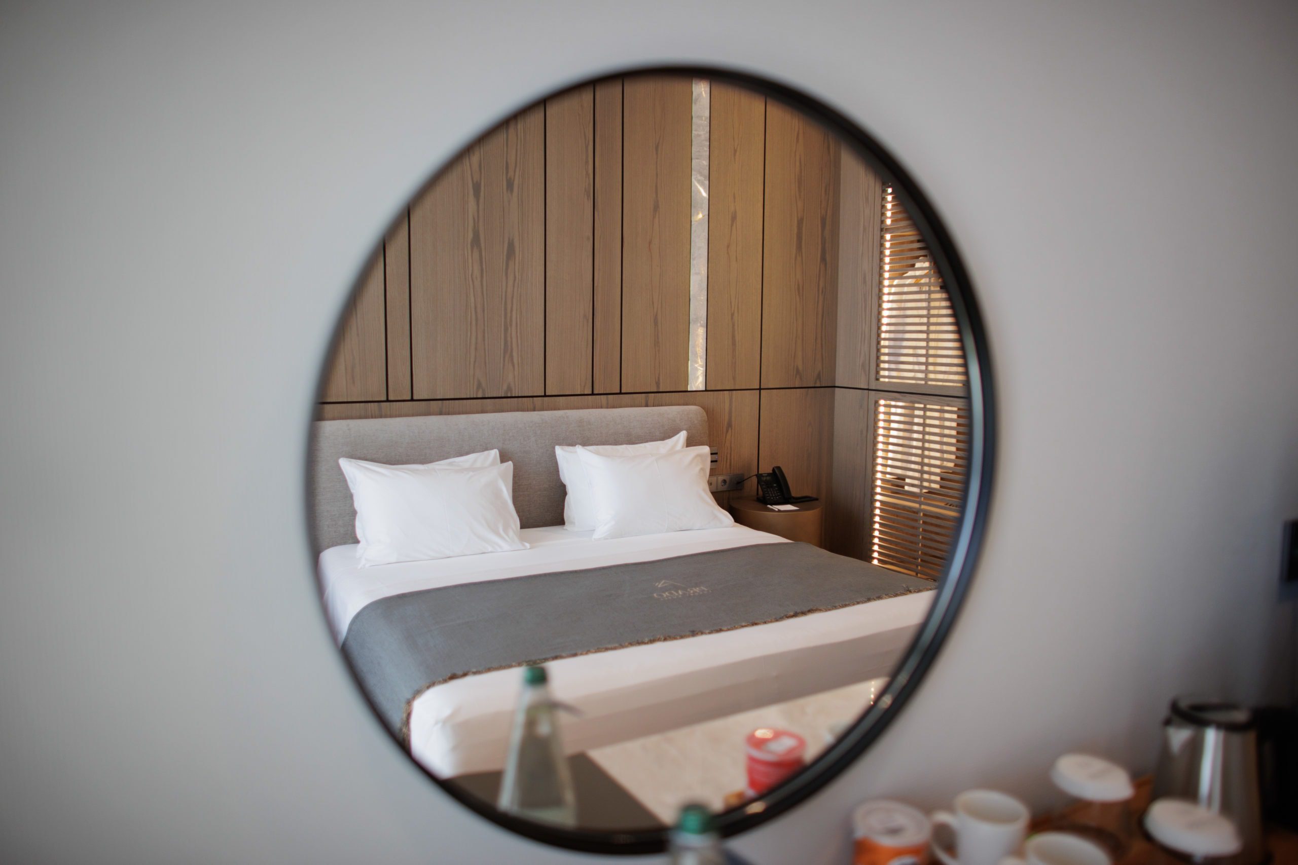 prado_luxury_hotel_bed_mirror_view