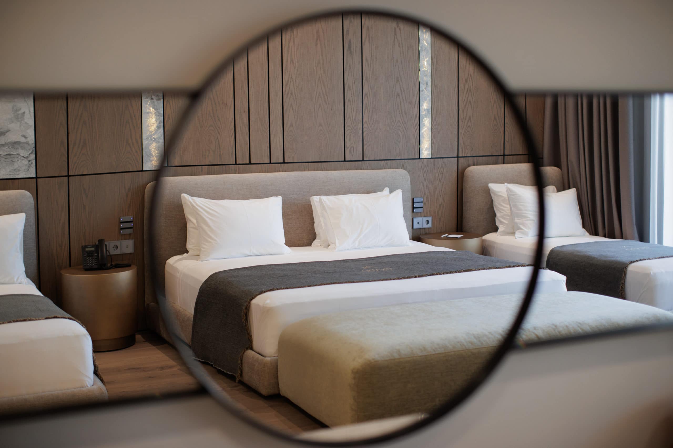 prado_luxury_hotel_family_suite_bed_mirror_view_closeup