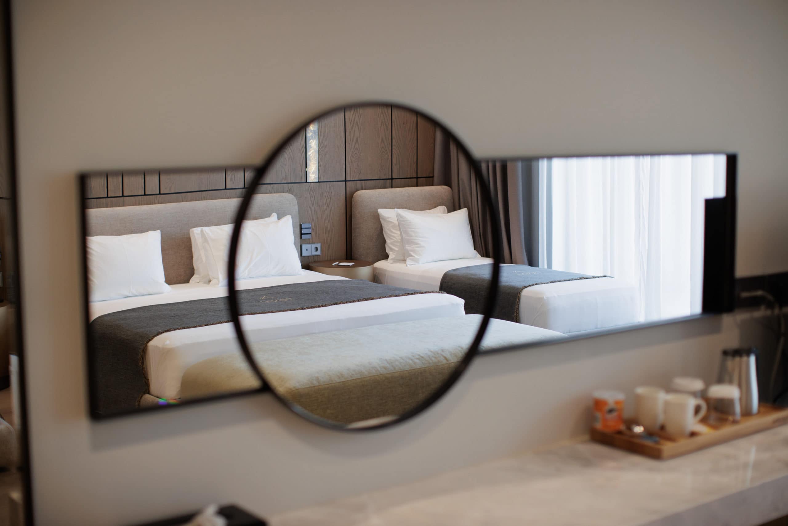 prado_luxury_hotel_family_suite_beds_mirror_view