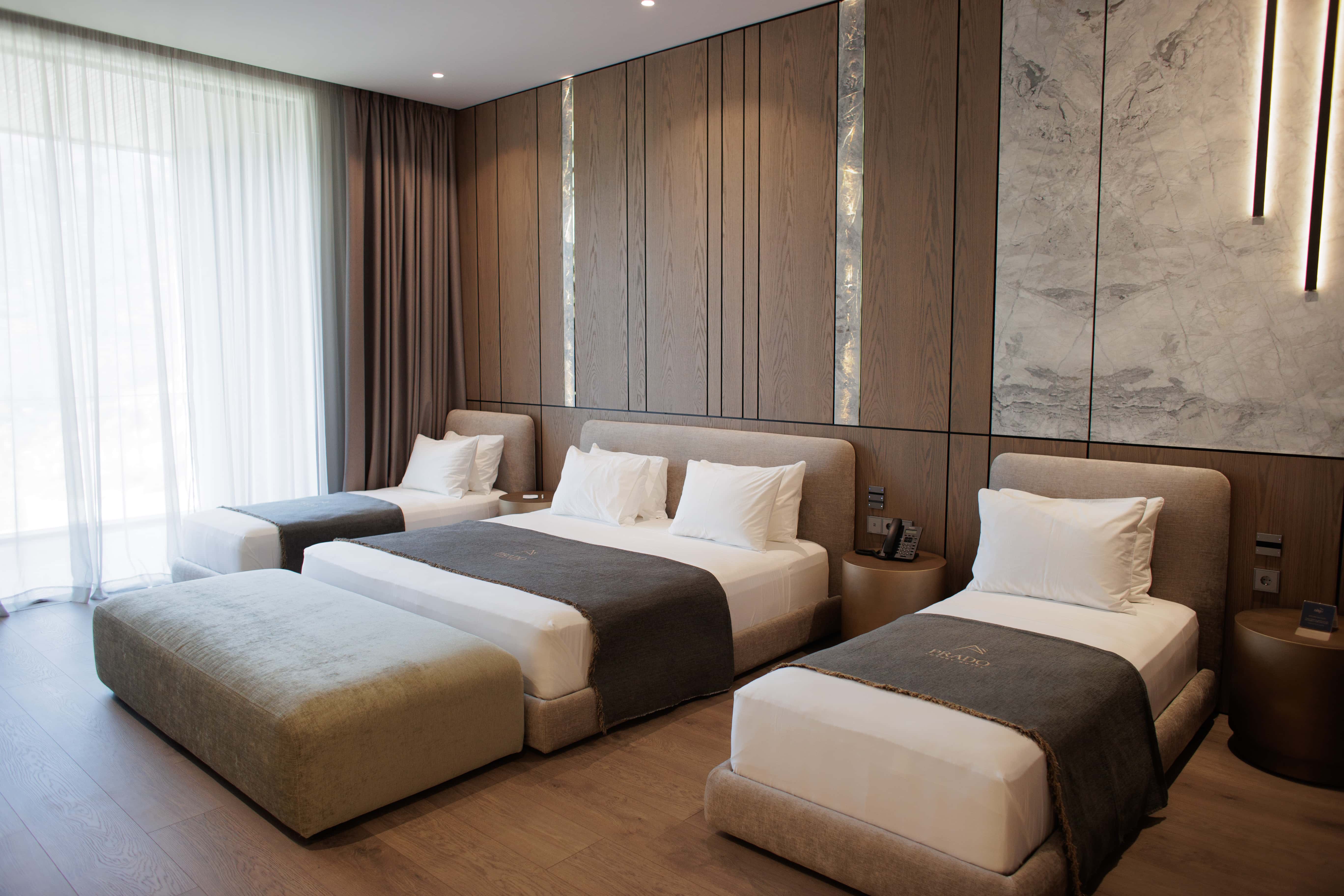 prado_luxury_hotel_room_family_suite_beds_view
