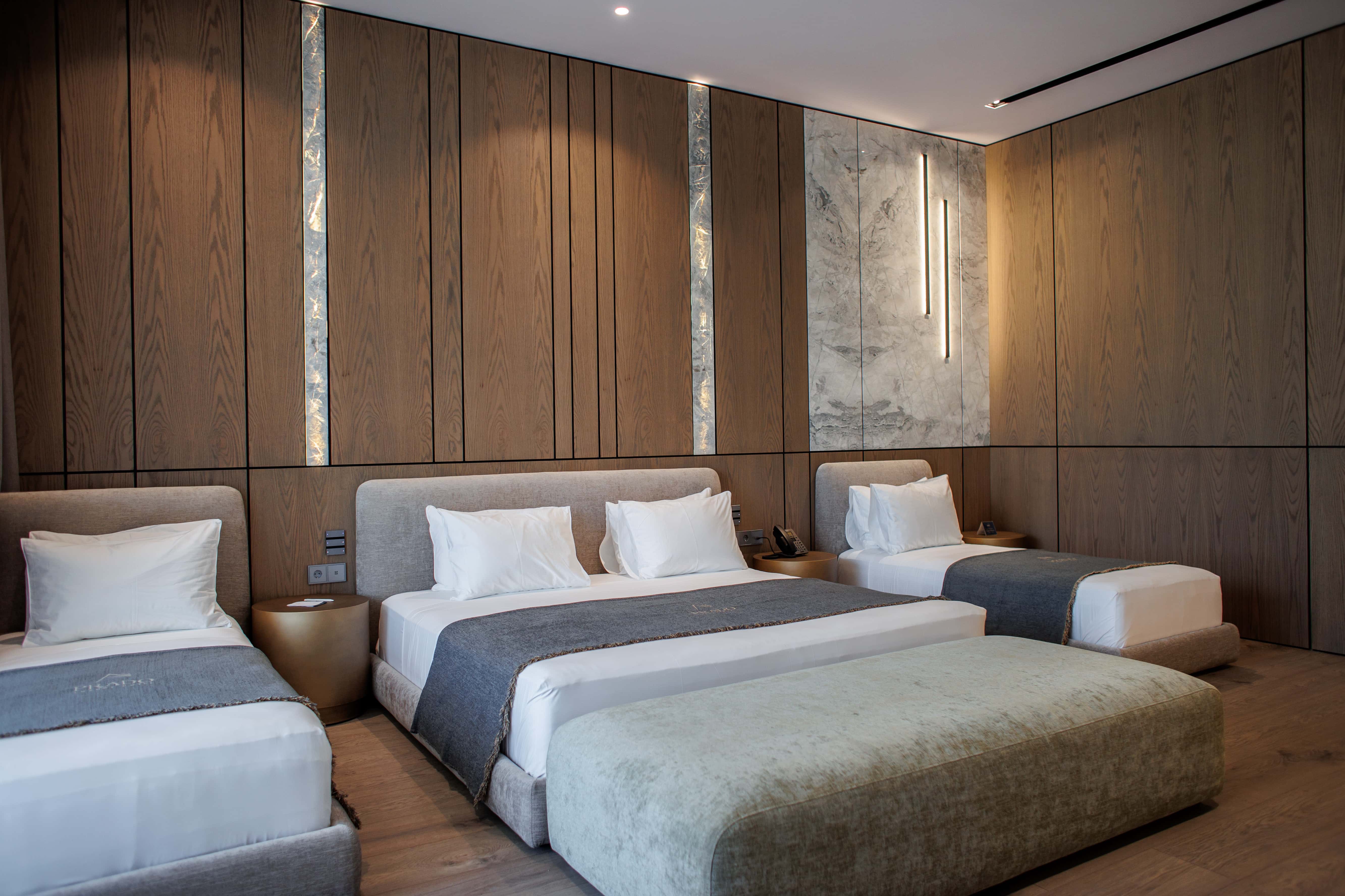 prado_luxury_hotel_room_family_suite_beds_view_lights