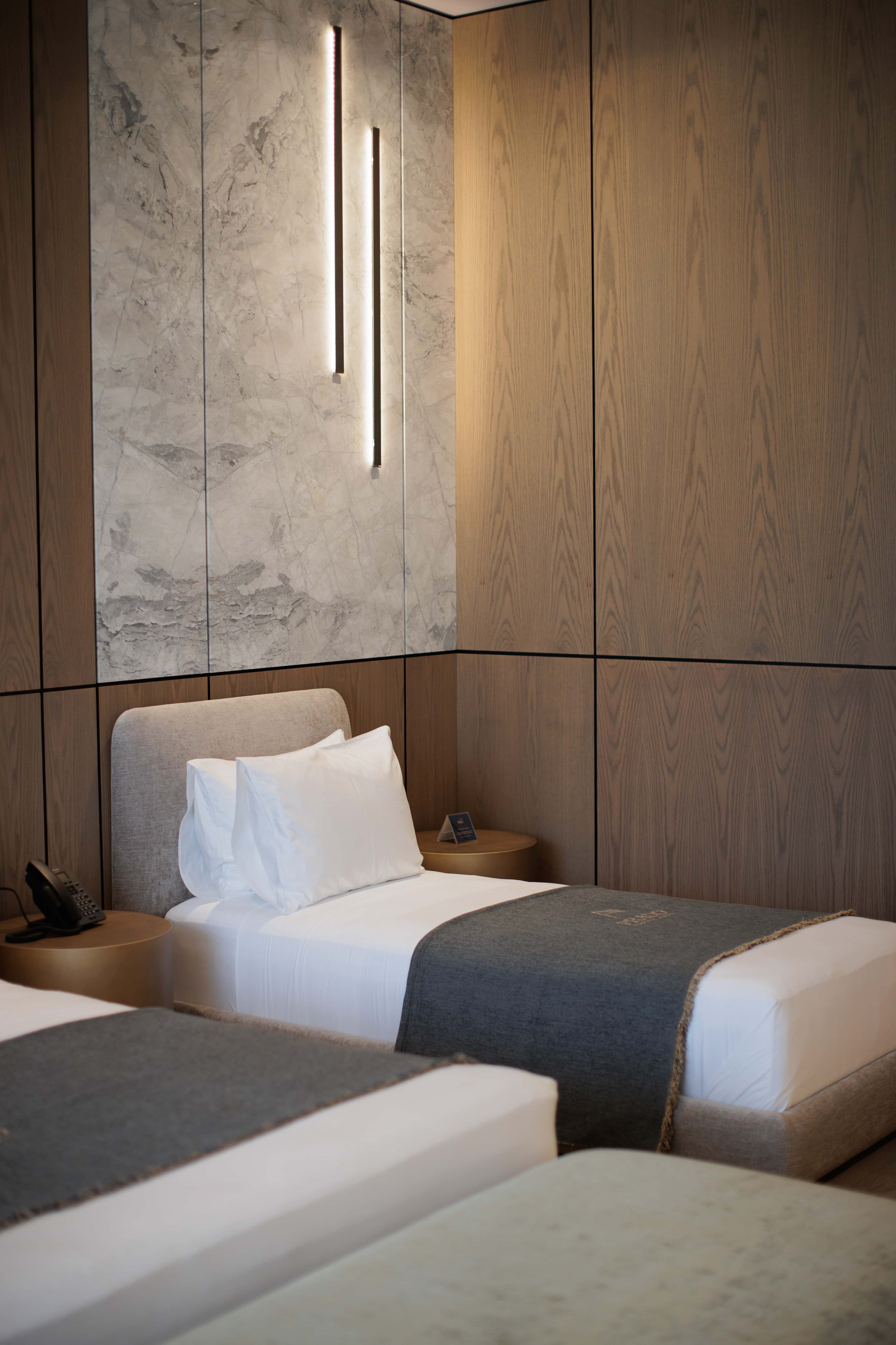 prado_luxury_hotel_room_family_suite_single_bed_lights